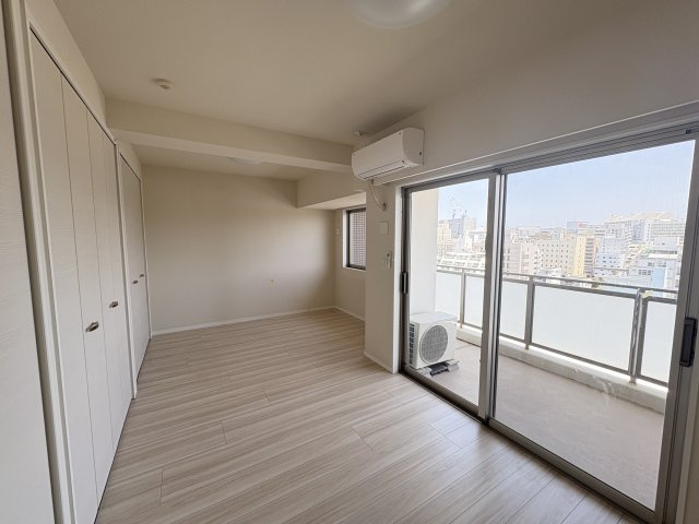 〇ル・サンク旭橋の洋室