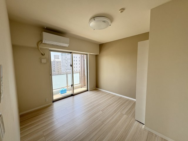 〇ル・サンク旭橋の洋室