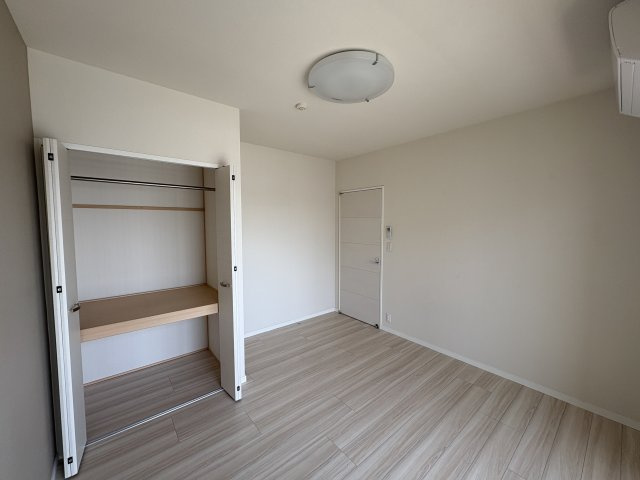 〇ル・サンク旭橋の洋室