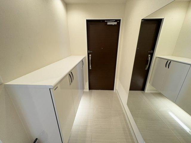 〇ル・サンク旭橋の玄関