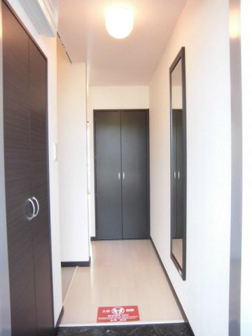 レオネクストファミールＡｉの玄関