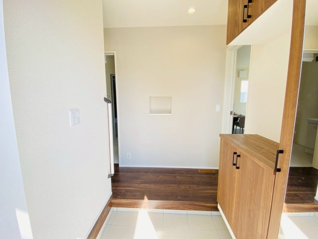 リナージュ／東区水源第1期／1号棟の玄関