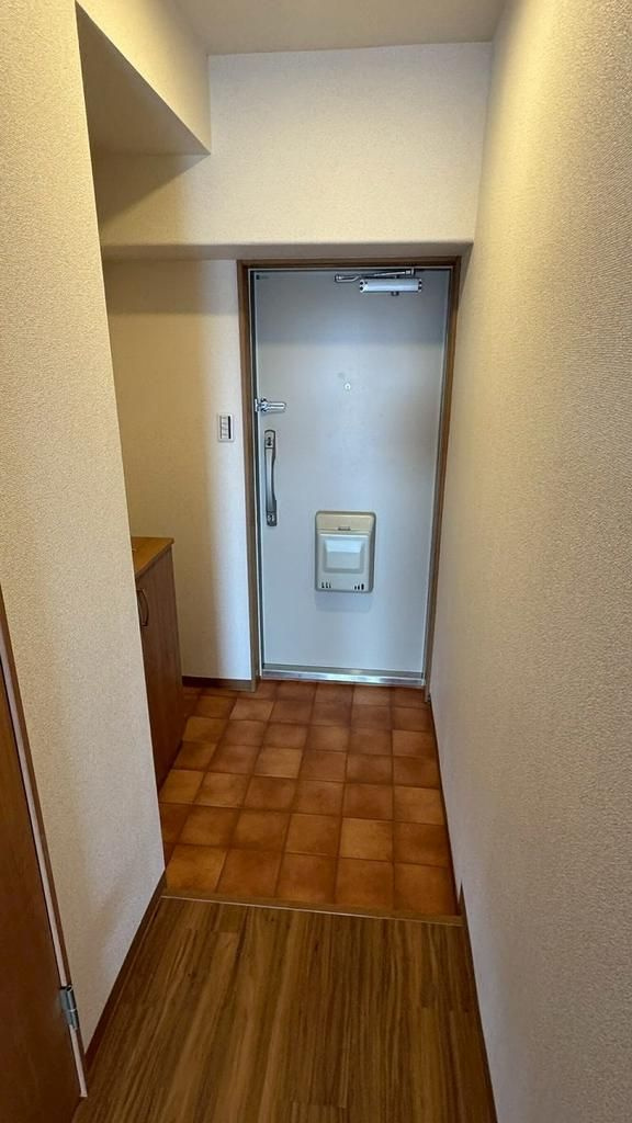 青梅市新町９丁目の中古マンションの玄関