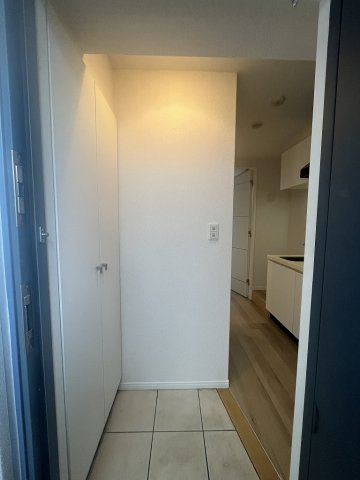 エスティメゾン登戸の玄関