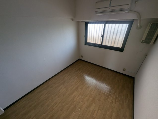 ローレル蛍池の寝室