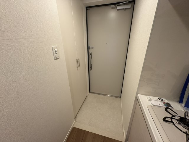 ケイディーエックスレジデンス原木中山の玄関