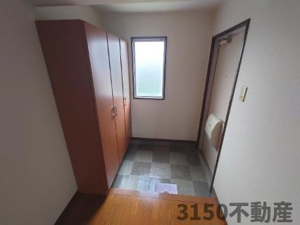 サン・パープル仲家の玄関