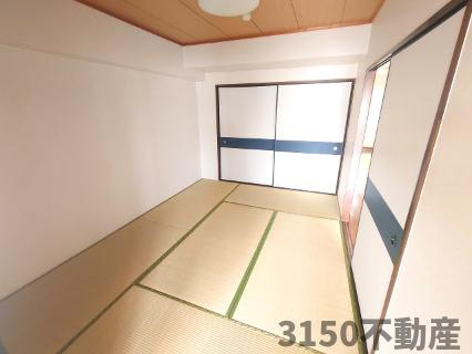 サン・パープル仲家の和室