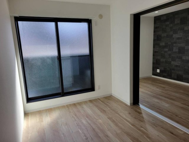 泉佐野市元町　一棟収益アパートの洋室