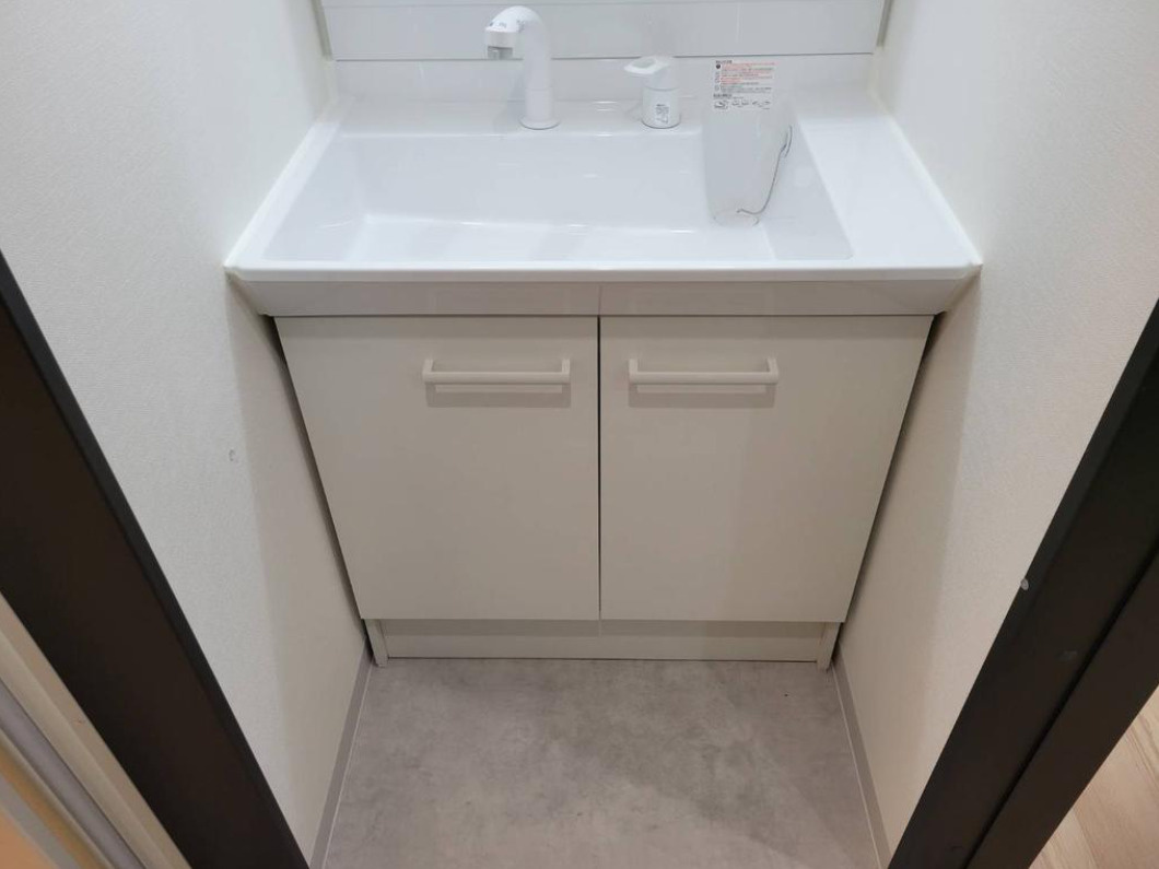 泉佐野市元町　一棟収益アパートの洗面所