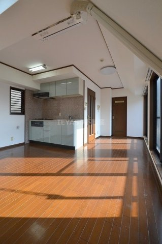 広島市西区己斐西町の賃貸マンションの居間・リビング