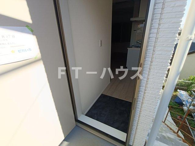Likes飯山満町Ｂ棟の玄関