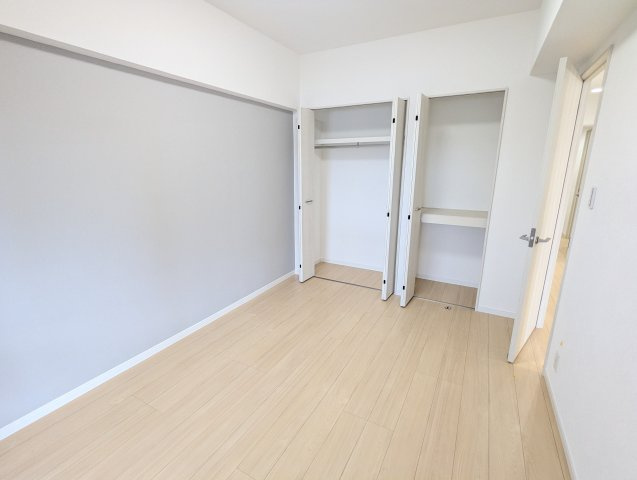 ライオンズマンション仲西の洋室