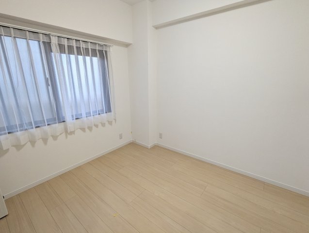 ライオンズマンション仲西の洋室