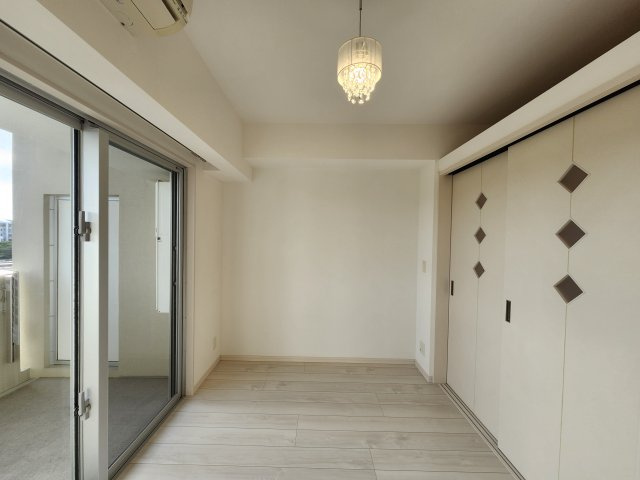 ワイズシティ壺川ステーションの洋室