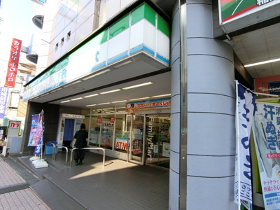 ファミリーマート稲田堤南口店まで100ｍ