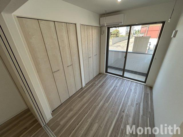 ジーメゾン岸和田ラクセルの洋室