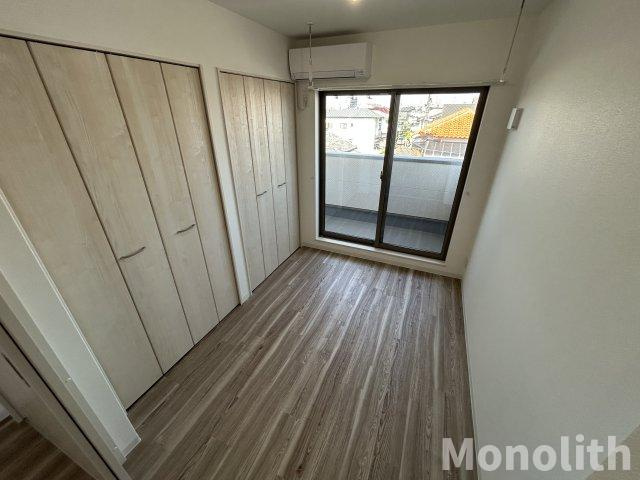 ジーメゾン岸和田ラクセルの洋室