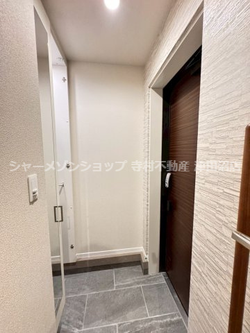 トラストメゾンしらぎくの玄関