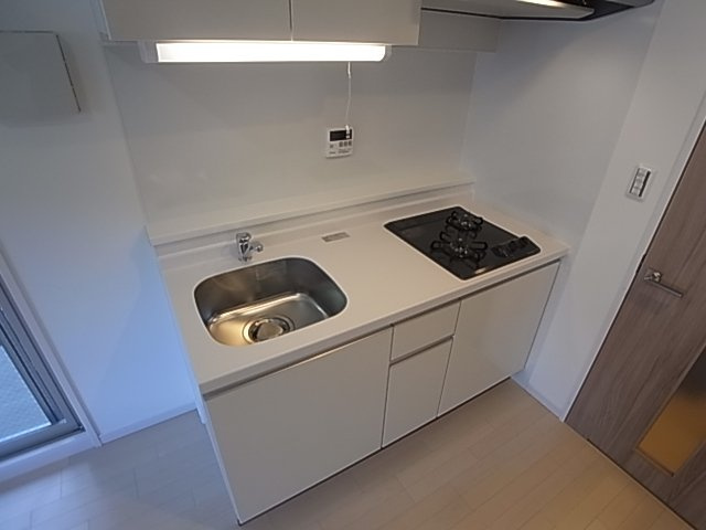 神戸市兵庫区大開通７丁目の賃貸マンションのキッチン|システムキッチン（ガス２口）