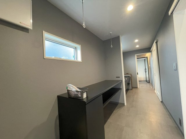 ミサワホーム施工のガレージ付平家住宅のランドリースペース