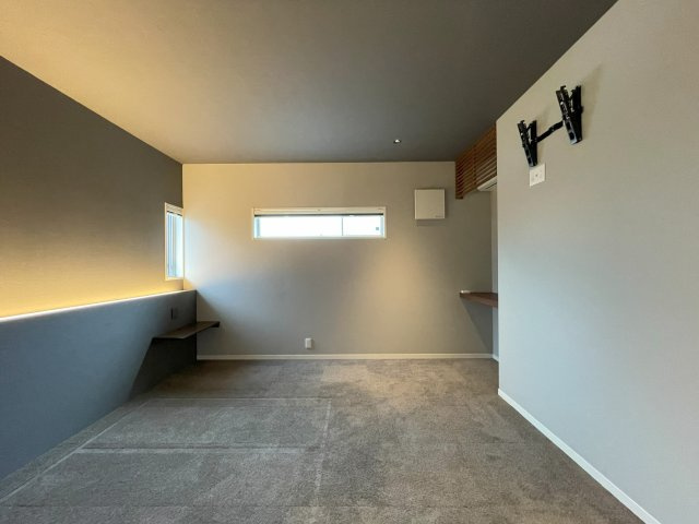 ミサワホーム施工のガレージ付平家住宅の寝室