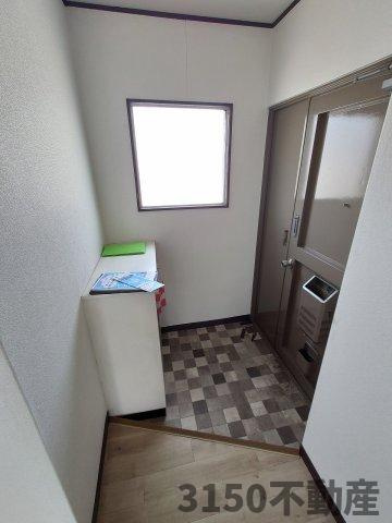辻広ビルの玄関