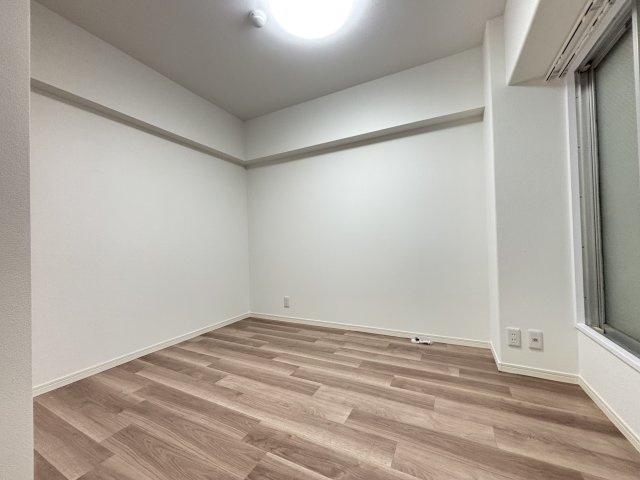 コスモ西葛西の洋室