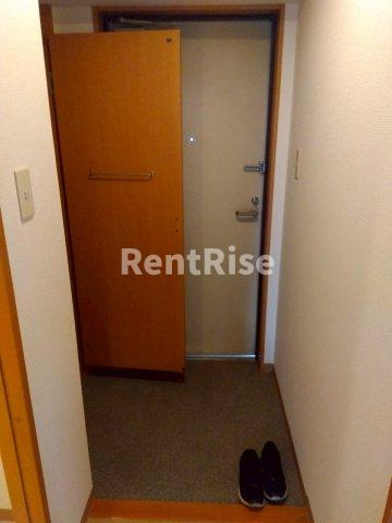 ハイツオレンジAの玄関