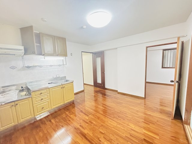 〇ネクスコート旭の居間・リビング