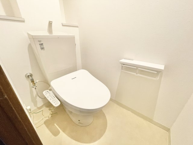 ダイアパレス枚方山田池公園のトイレ|落ち着いた色調のトイレです