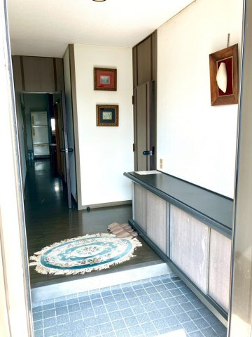 坂出市旭町　ミサワホーム施工平屋戸建　敷地面積約９４坪の玄関|下駄箱つきのすっきりとした玄関です