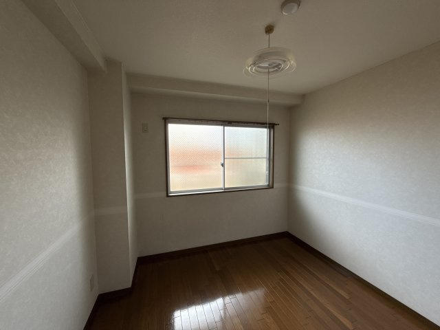 グリーンコスモ田井の洋室