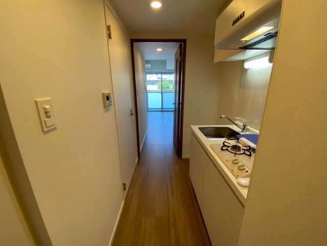 ケーディーエックスレジデンス原木中山の玄関