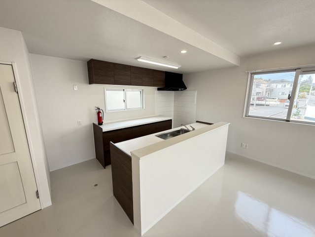 プレジール屋嘉A-1,A-2　収益物件のキッチン
