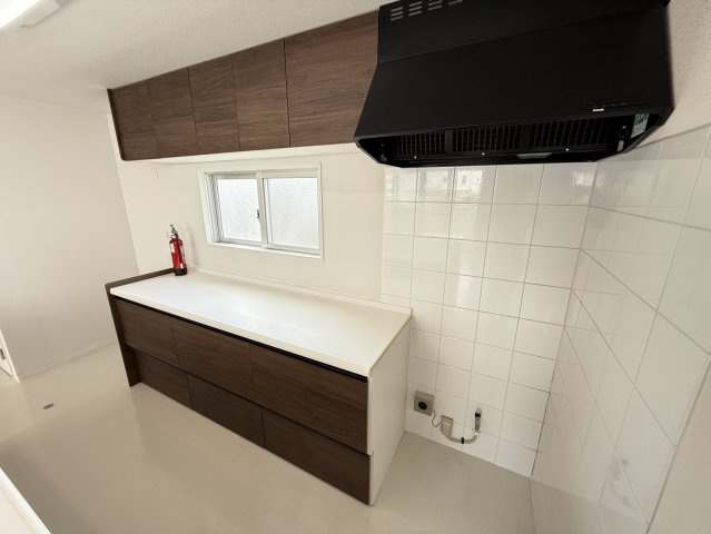 プレジール屋嘉A-1,A-2　収益物件のキッチン