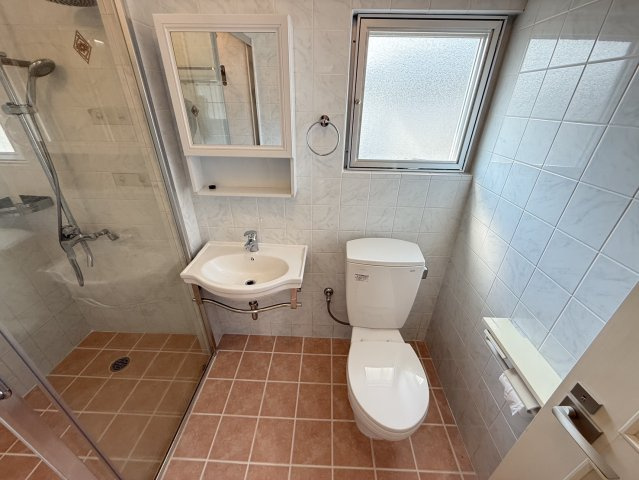 プレジール屋嘉A-1,A-2　収益物件のトイレ