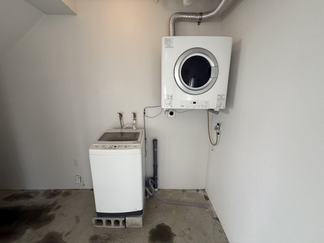 プレジール屋嘉A-1,A-2　収益物件のランドリースペース