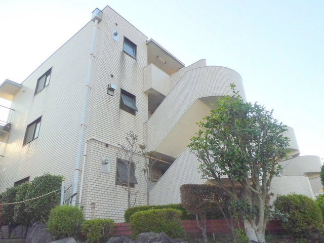 第一リゾート法泉のエントランス|外壁全面タイル貼　鉄筋コンクリート造　温泉付分譲マンション