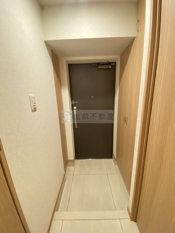 北区王子本町２丁目の賃貸マンションの玄関