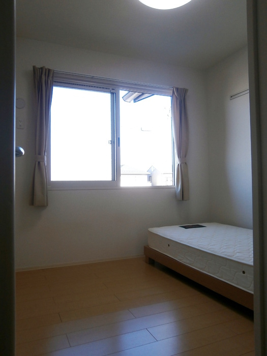 エトワール白沢の内装|洋室（ベット付き）