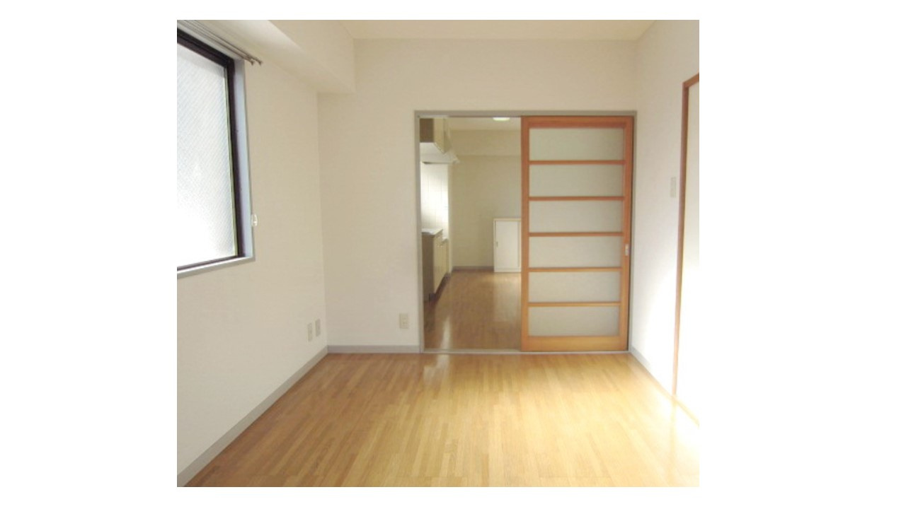 東京都府中市若松町1丁目　店舗付き１棟売りマンション　投資・収益物件の洋室