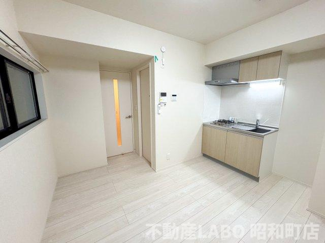 ハーモニーテラス遠里小野Ⅲの居間・リビング