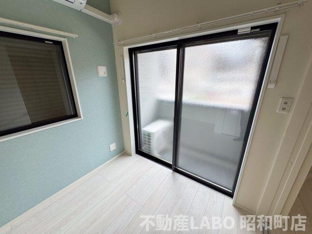 ハーモニーテラス遠里小野Ⅲの洋室