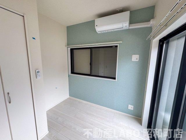 ハーモニーテラス遠里小野Ⅲの寝室