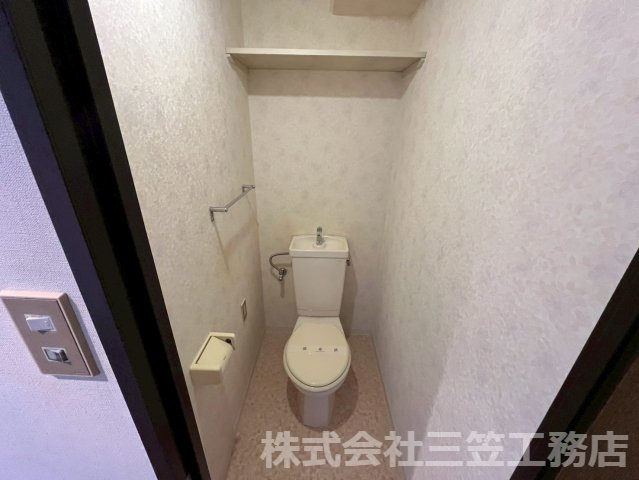 寝屋川市出雲町の賃貸マンションのトイレ