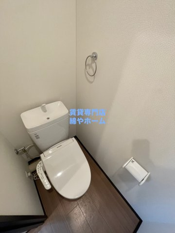 みおつくし岸里のトイレ|落ち着いた色調のトイレです