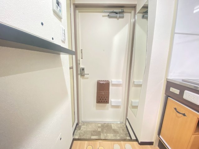 高槻市芥川町２丁目の賃貸マンションの玄関