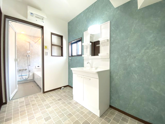 花野光ヶ丘1丁目　新築戸建ての洗面所|３帖分のゆとりのある洗面脱衣所です。