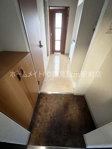 大阪市城東区今福東１丁目の賃貸マンションの玄関